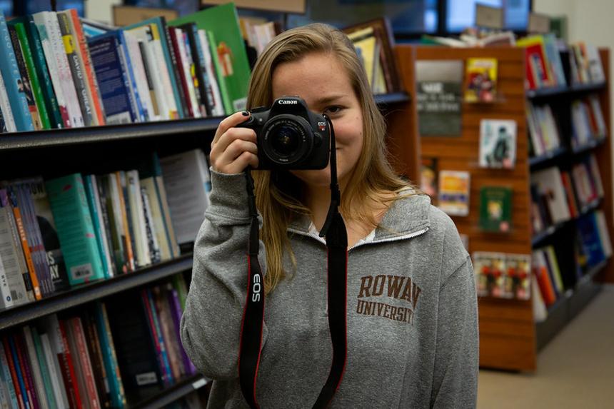 Student with a camera