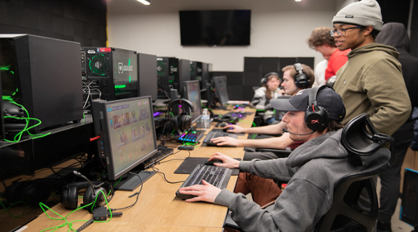 students playing games on laptops