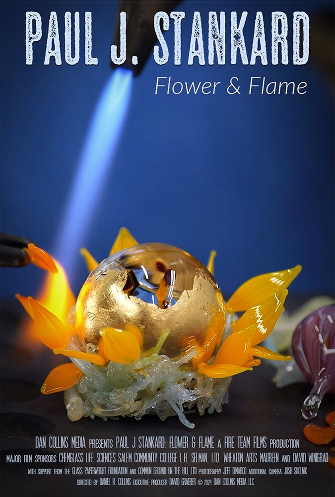 Movie poster for the documentary Paul J. Stankard: Flower & Flame. There is a photo of a glass flower with a fame pointed at it. 